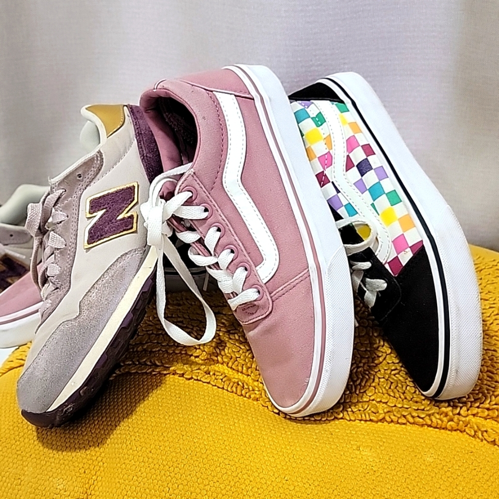 2 pairs of Vans and 1 New Balance shoes